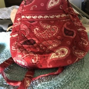 Red print Vera Bradley backpack bag with plastic lined makeup zipper bag